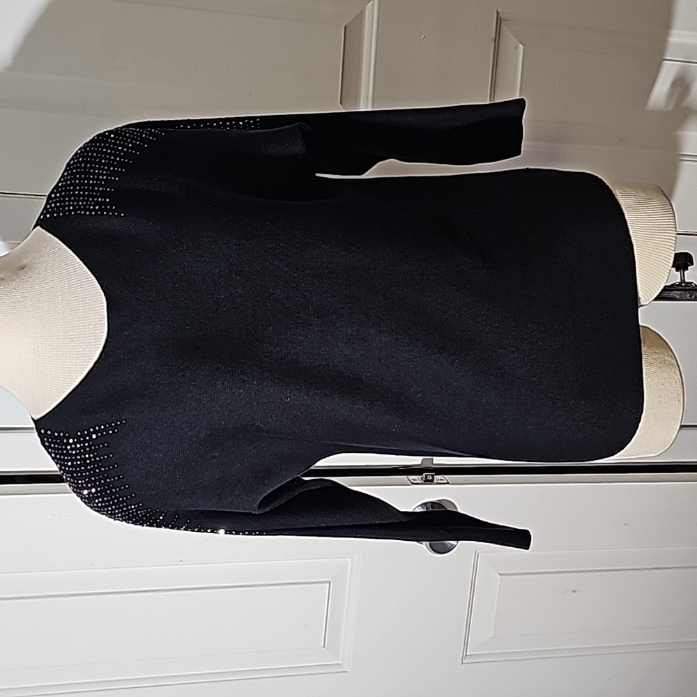 Birch NY lightweight black sweater.‎ Size small. Bling at the shoulders.
